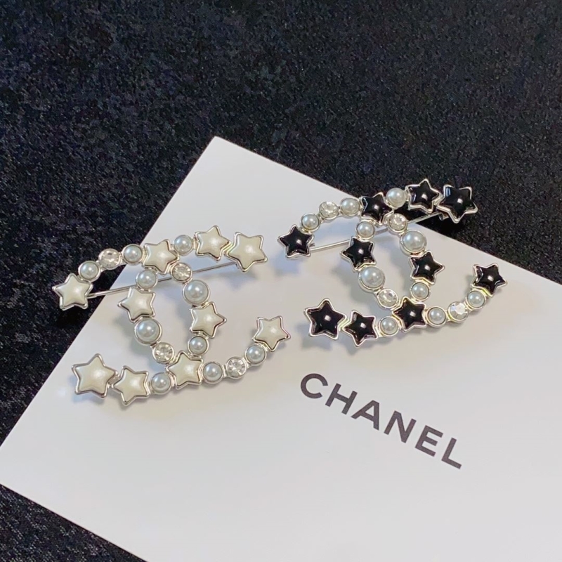Ch**el brooches